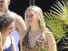Harper Beckham, 14 anos, invade o guarda-roupa de sua mãe Victoria enquanto ela usa seu vestido de verão de chiffon para o almoço em família durante férias luxuosas em Ibiza