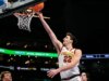 Relatórios: Milan Momcilovic retornando à faculdade após flertes da NBA