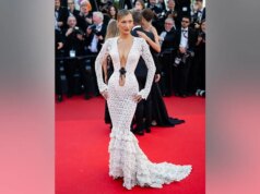 Bella Hadid surpreende com vestido de renda transparente com decote profundo em Cannes