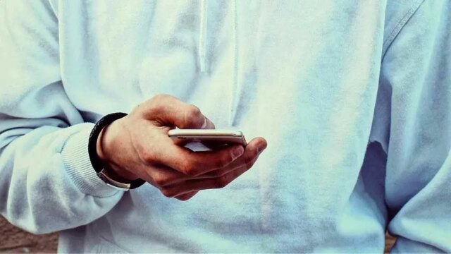 person-using-phone.jpeg