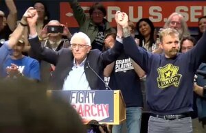 O candidato ao Senado do Maine, Graham Platner, abraça o socialismo democrático no comício de Bernie Sanders em Portland
