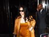 Rihanna chama a atenção em um vestido decotado de bronze enquanto apoia A$AP Rocky enquanto ele ganha o prêmio inaugural de Cineasta do Ano do Tribeca X