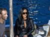 Kim Kardashian continua sua aquisição de Mônaco depois de roubar a cena no Grande Prêmio com o namorado Lewis Hamilton enquanto ela exibe suas curvas em couro colante ao corpo