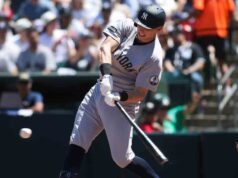 Yankees usam a terceira entrada de 13 corridas para vencer o Atletismo