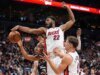 Relatórios: Warmth F Andrew Wiggins opta, assina extensão