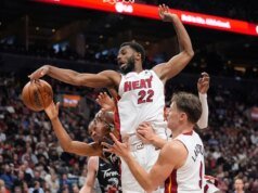 Relatórios: Warmth F Andrew Wiggins opta, assina extensão