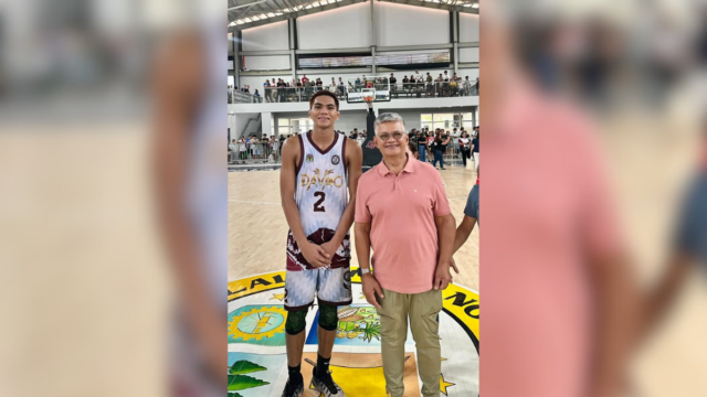 Agusan-del-Sur-Gov.-Santiago-Cane-Jr-poses-with-the-late-Rene-Clert-Baterbonia-after-a-game-during-t.webp
