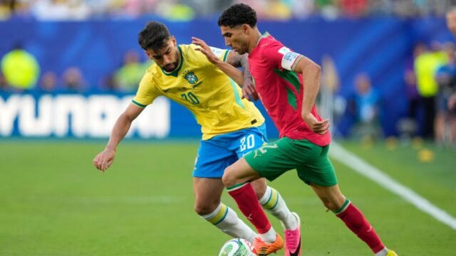 Brazils-Lucas-Paqueta-20-challenges-for-the-ball-with-Moroccos-Achraf-Hakimi-2.jpg
