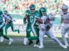 Emilus marca três TDs, Roughriders se recuperam no minuto last para derrotar os Leões