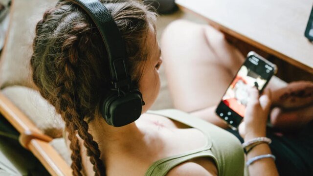 girl-with-headphones-gettyimages-2167057002.jpg