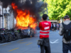 Protesto anti-G7 torna-se violento enquanto manifestantes incendeiam Tesla e quebram janelas de escritórios da ONU