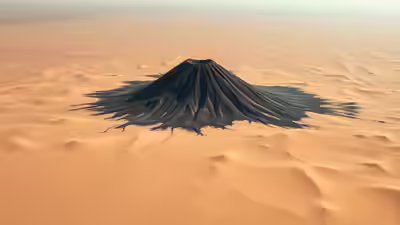 jet-black-sahara-volcano-and-skull-shaped-crater-captured-in-stunning-nasa-astronaut-photo.jpg